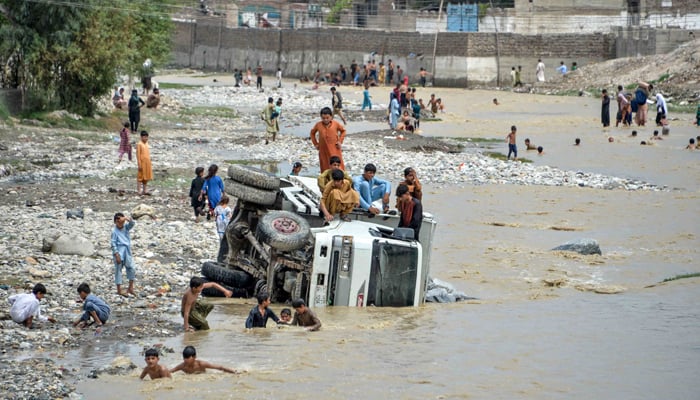 Flash floods in Afghanistan kill over 100