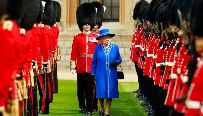 Queen Elizabeth’s guards raided by police after a handful tested ...