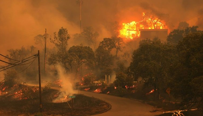 Trump to visit California as record fires kill 31 people