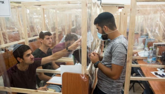 Israel to lockdown nationwide during main holiday season amid virus surge
