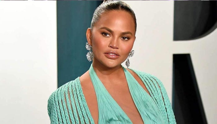 Chrissy Teigen gushes over her ‘strong’ third baby for ‘working so hard’