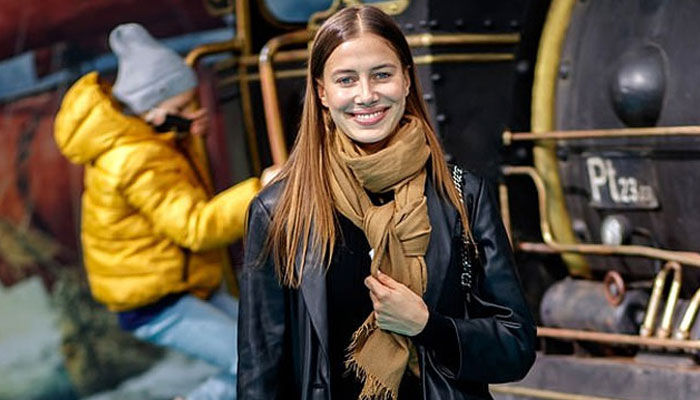 Brad Pitt's girlfriend Nicole Poturalski sparkles in leather jacket as she attends Berlin premiere