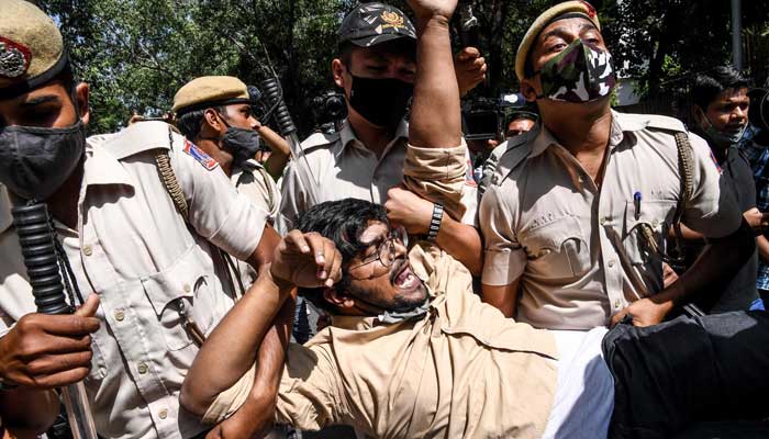 Protests in India after family of Hathras gang rape victim alleges police cremated body without consent