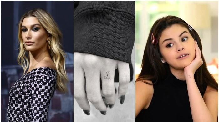 hailey-baldwins-j-tattoo-speculated-to-mimic-selena-gomezs-promise-ring