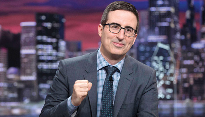 John Oliver celebrates his civic first after casting ballot for the first time in US