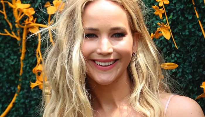 Jennifer Lawrence runs through the streets to celebrate Biden-Harris win