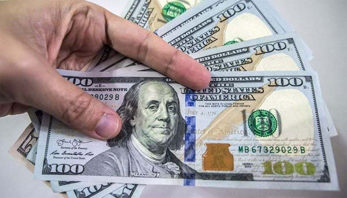 Dollar makes gains against rupee