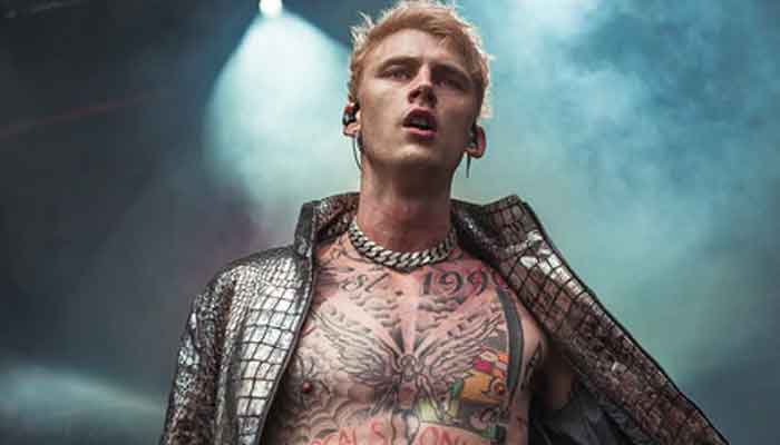 Machine Gun Kelly posts expletive-laden tweet against publications siding with Eminem