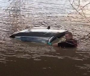 WATCH: UK couple saved two hours after car drowns in freezing cold floodwater