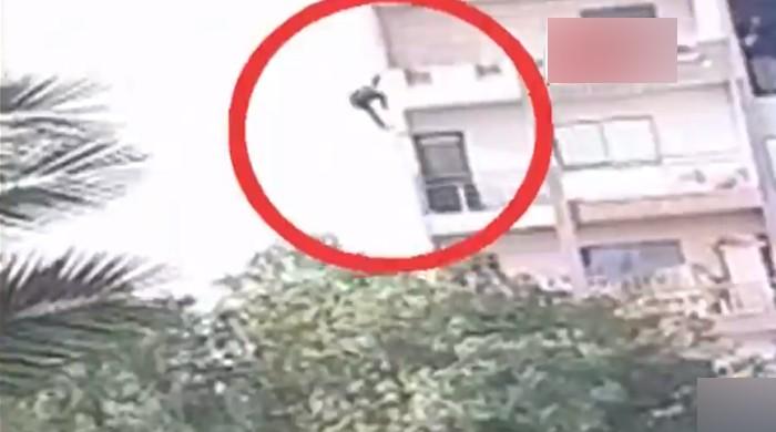 Karachi woman throws child down from multi-storey building before leaping off herself