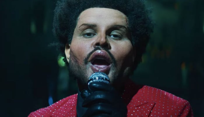 The Weeknd debuts drastically-altered face in his new music video