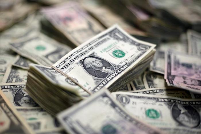 US dollar loses against rupee