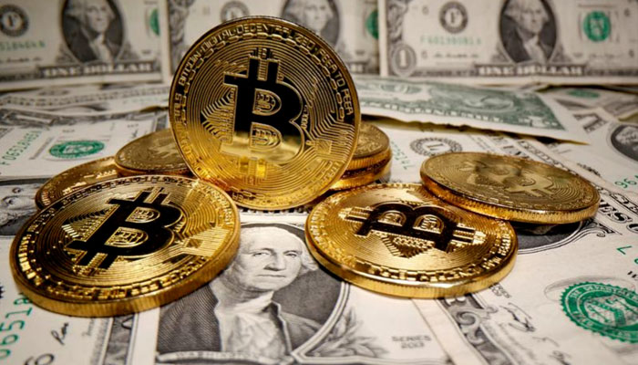 Bitcoin crosses $60,000 threshold to hit new record