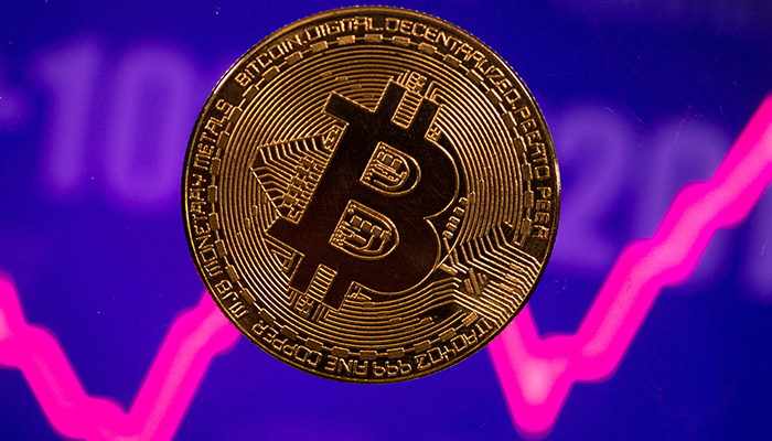 Bitcoin reverses course sharply after hitting weekend record