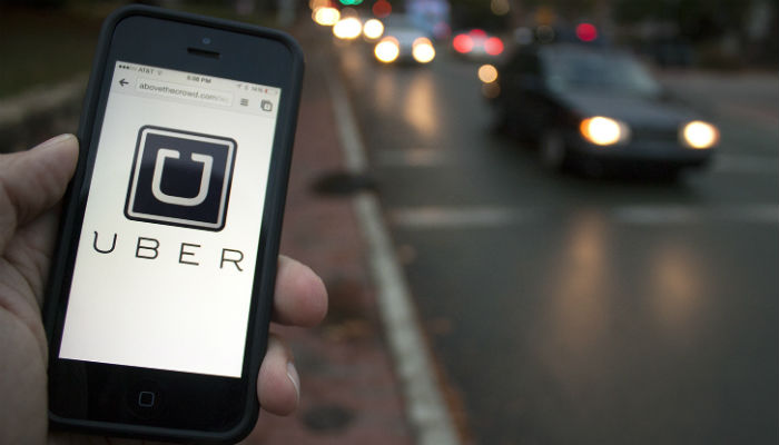 Uber grants its UK drivers employee status in world first
