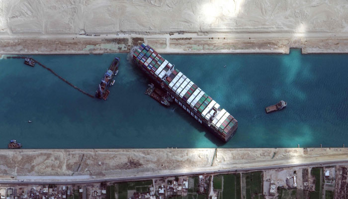 Container ship blocking Suez Canal partially refloated