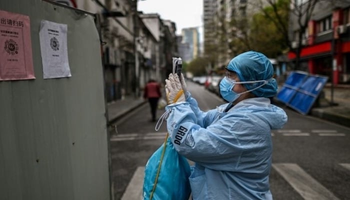 China reports biggest daily coronavirus case jump in over two months