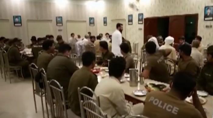 Watch: Vehari Police officers share Sehri, Iftar with protesters who assaulted them