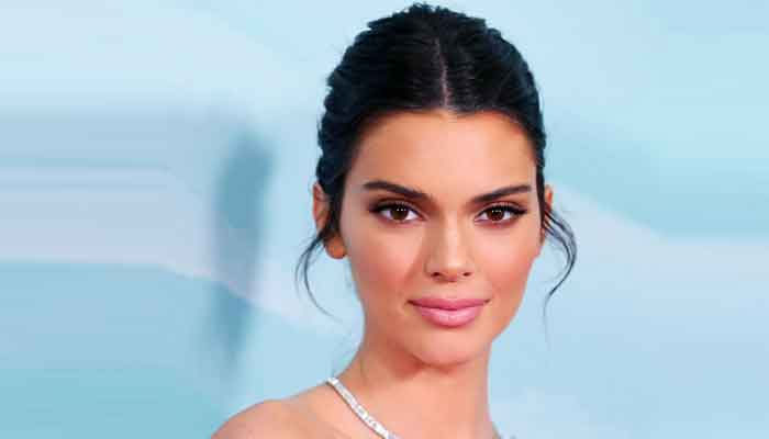 Kendall Jenner flashes toned abs while having dinner in Malibu