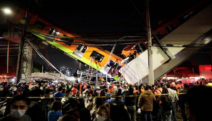 Mexico City rail overpass collapses onto road, killing at least 23