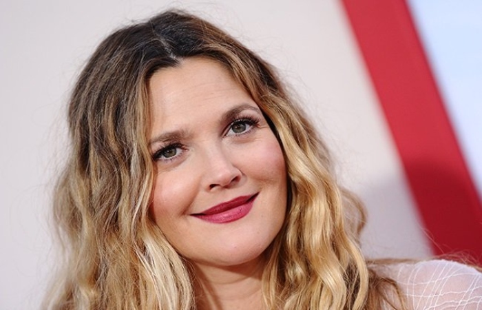 Drew Barrymore gets emotional as she details the meaning behind her tattoo