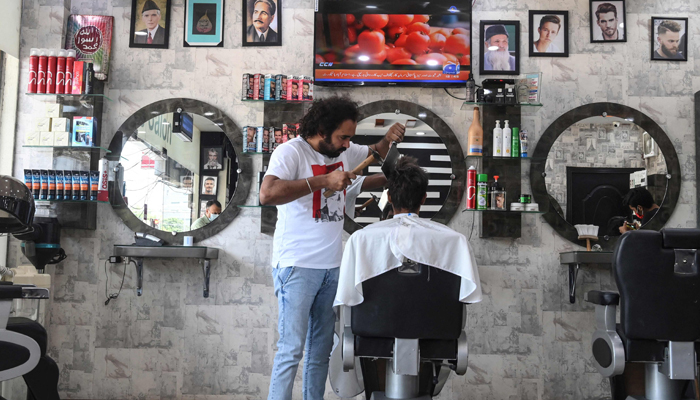 WATCH: Pakistani barber offers hair-raising cuts with cleavers, blowtorches
