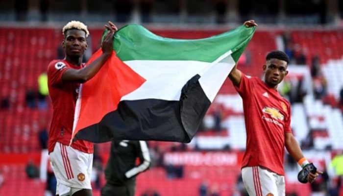 Man Utd duo Pogba, Diallo hold Palestine flag in front of thousands at Old Trafford