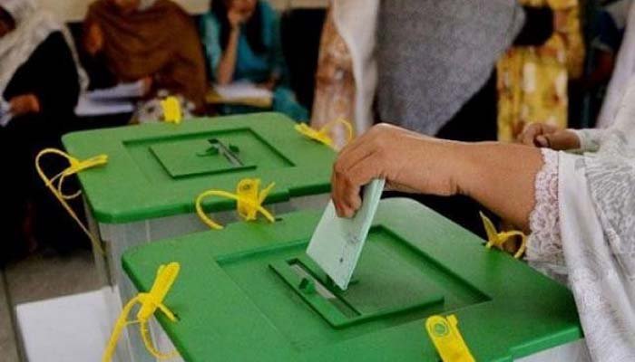 Image showing a person inserting a ballot paper in a ballot box. Photo: File.