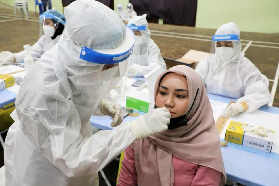 Southeast Asia's coronavirus surge prompts shutdowns and alarm