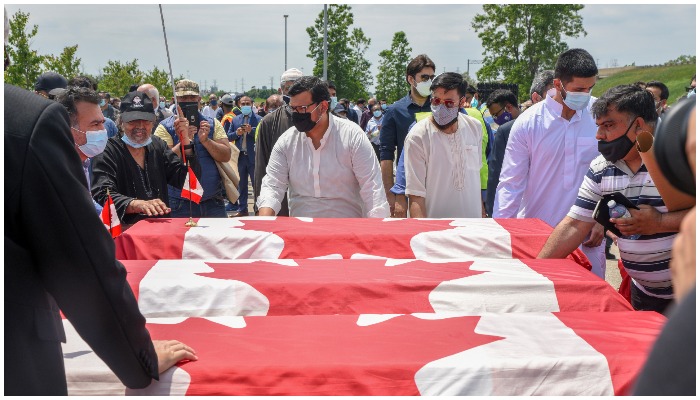 Farewell given to Muslim family killed in truck attack with coffins draped in Canadian flags