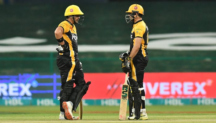 Peshawar Zalmis Haider Ali and Hazratullah Zazai during their teams match against Karachi Kings at Abu Dhabis Sheikh Zayed Stadium. Photo: PSL