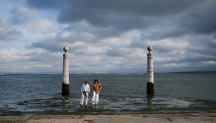 People walk on Cais das Colunas in the Tagus river estuary in Lisbon, Portugal, during a two-day weekend ban on unauthorised travel into and out of the capitals metropolitan area imposed to contain a new spike in COVID-19 infections, June 18, 2021. — Reuters/File