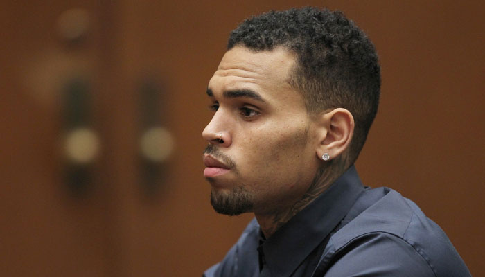 The woman accused singer Chris Brown of smacking her in the head