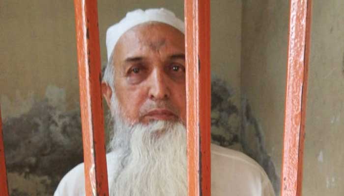 Accused Mufti Aziz-ur-Rehman behind bars. Picture Punjab IG Inam Ghani.