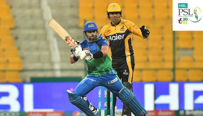 Multan Sultans batsman Mohammad Rizwan and Peshawar Zalmis Kamran Akmal look towards the ball at Abu Dhabis Sheikh Zayed Stadium. Photo:PSL