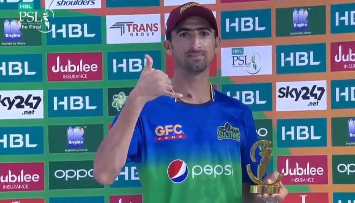 Shahnawaz Dahani celebrates with the trophy Photo: Dahani Twitter account