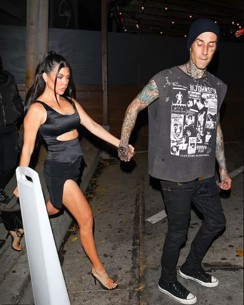 Kourtney Kardashian steps out with Travis Barker at magazine party