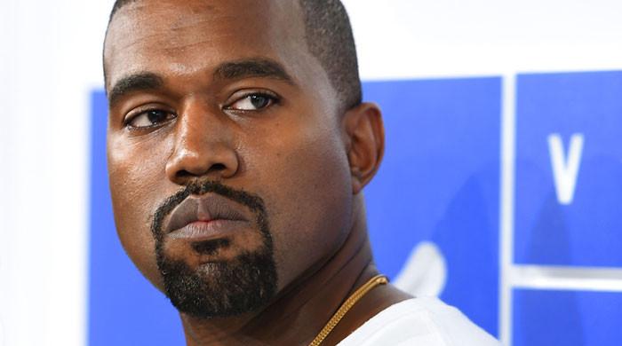 Kanye West sues Walmart for selling 