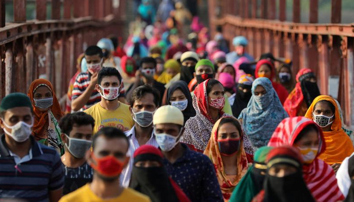 Garment workers return from a workplace as factories reopened after the government has eased the restrictions amid concerns over the coronavirus disease (COVID-19) outbreak in Dhaka, Bangladesh, May 4, 2020. — Reuters/File