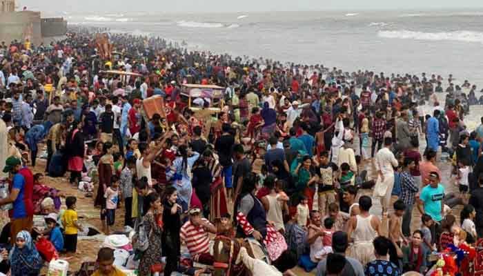 The sheer volume of people at Karachis Turtle beach. — File photo