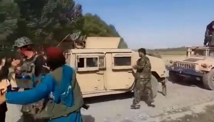 Taliban seize US forces vehicles and weapons from surrendering Afghan troops