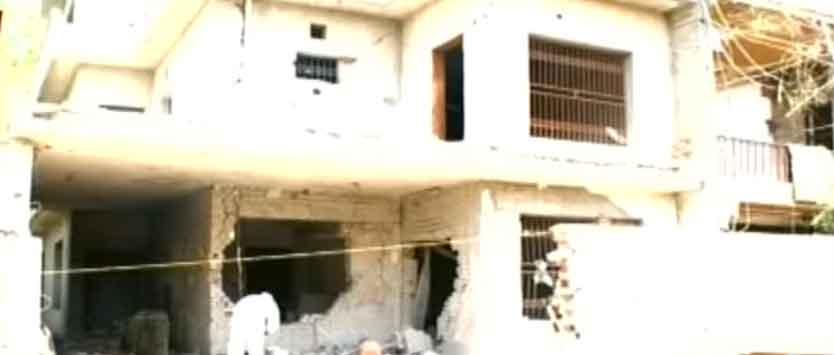 The house whose gate and front facade were completely destroyed in the attack. — Geo News