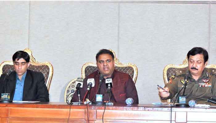 Federal Minister for Information and Broadcasting Chaudhary Fawad Hussain (C) along with Special Assistant to the Prime Minister on National Security Division and Strategic Policy Planning Dr. Moeed W. Yusuf (L) and Inspector General of Police Punjab Inam Ghani brief the media at the PM Secretariat, in Islamabad, on July 4, 2021. — APP photo by Saleem Rana