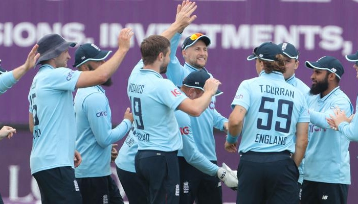 England cricket team celebrates after a dismissal. Photo: AFP