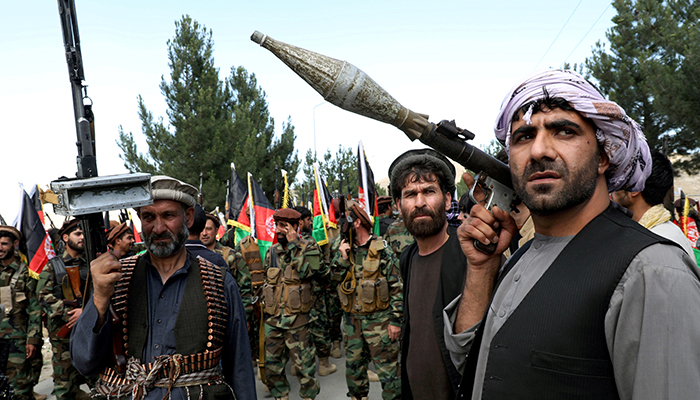 Armed men attend a gathering to announce their support for Afghan security forces and that they are ready to fight against the Taliban, on the outskirts of Kabul, Afghanistan June 23, 2021. — Reuters/File
