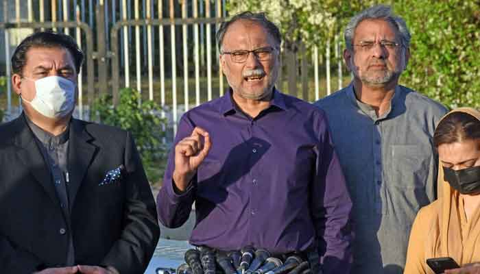 PML-N leader Ahsan Iqbal speaking to media persons outside Parliament House in Islamabad, on April 1, 2021. — Online/File