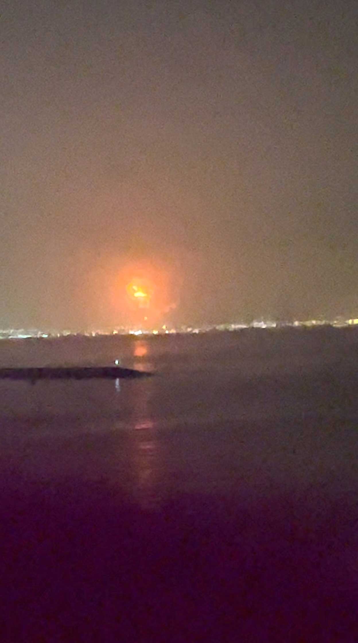 Fire caused by an explosion is seen at Dubais Jebel Ali Port in Dubai, United Arab Emirates, July 7, 2021, in this still image taken from video obtained from social media.- via REUTERS