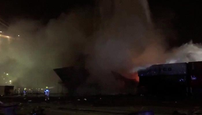 Plumes of smoke rise from a container ship anchored in Dubais Jebel Ali port as emergency services try to contain the fire, in Dubai, UAE, July 7, 2021 in this still image taken from a video. — Reuters/File