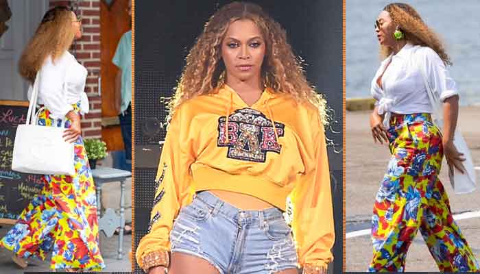 Beyonce cuts a stylish figure in colorful pants and white top while boarding a helicopter