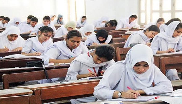 Students busy solving exam papers in a classroom. Photo: File